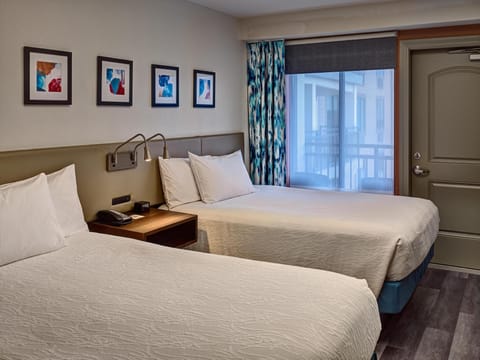 Desk, laptop workspace, blackout drapes, iron/ironing board