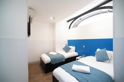 Twin Room, No Windows | Iron/ironing board, free WiFi, bed sheets, wheelchair access