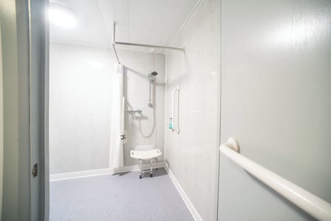 Double Room, Accessible, No Windows | Bathroom | Shower, hair dryer, towels