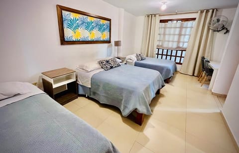 Family Triple Room | Desk, iron/ironing board, free WiFi, bed sheets