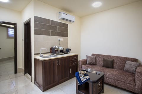 Apartment, 1 Bedroom | Living area | Flat-screen TV