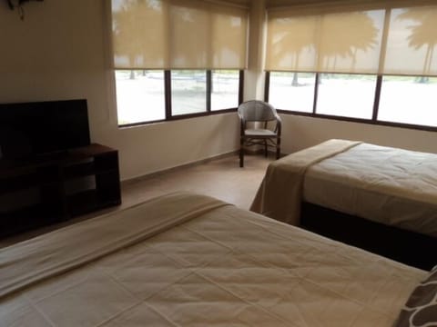 Family Room, Ocean View, Beachside | Hypo-allergenic bedding, iron/ironing board, bed sheets