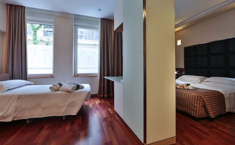 Comfort Room, Multiple Beds | Living area | TV