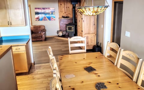 Dining Room Flows into Open Floor Plan Overlooks Forest, Mountains, & Valleys.