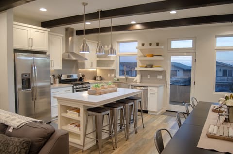 Kitchen with island bench seating for four.