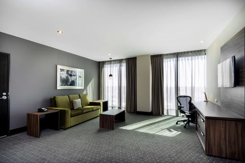 Suite, 1 Bedroom | In-room safe, desk, blackout drapes, iron/ironing board