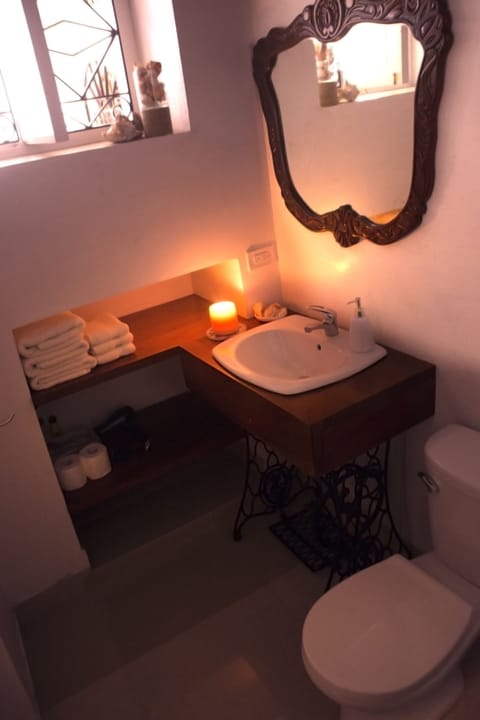 Apartment, 2 Bedrooms | Bathroom | Shower, hair dryer, towels, soap