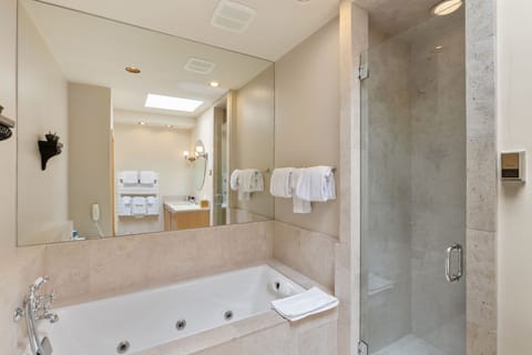 Condo, 1 Bedroom | Bathroom | Combined shower/tub, designer toiletries, hair dryer, bathrobes