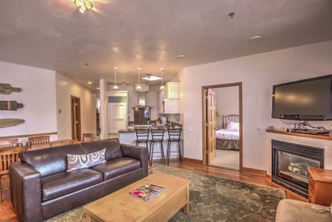 Deluxe Condo, 2 Bedrooms | Living room | 42-inch flat-screen TV with cable channels, TV, fireplace