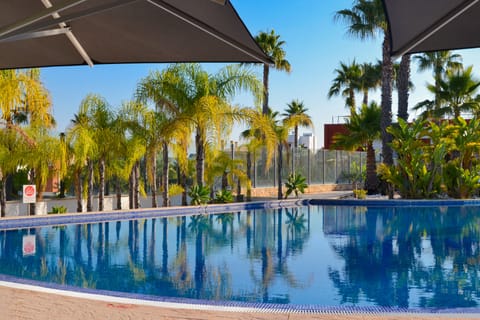 2 outdoor pools, pool umbrellas, sun loungers