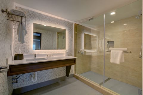 Suite, 1 King Bed | Bathroom | Free toiletries, hair dryer, towels, soap