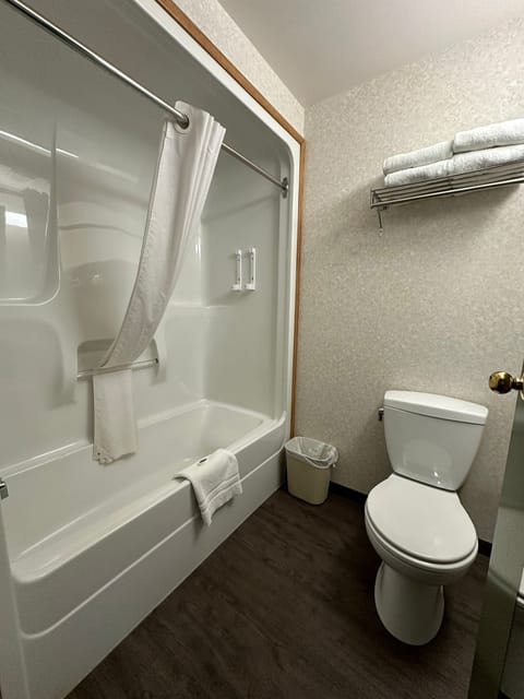 Room, 2 Queen Beds | Bathroom | Combined shower/tub, deep soaking tub, free toiletries, hair dryer