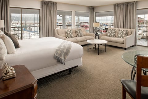 Premium King Suite with Marina View and Wrap-Around Balcony- No Pets | Premium bedding, down comforters, iron/ironing board, free WiFi