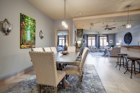 Large modern dining table with seating for 8! Original artwork and HIGH END deco