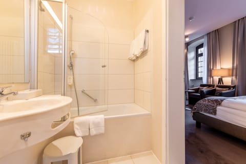 Shower, deep soaking tub, free toiletries, bathrobes