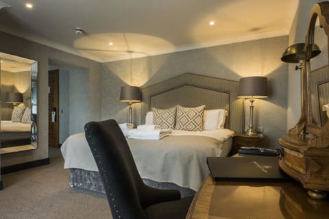 Deluxe Suite | Premium bedding, memory foam beds, in-room safe, individually decorated