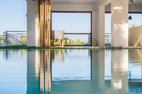 Outdoor pool, pool umbrellas, sun loungers