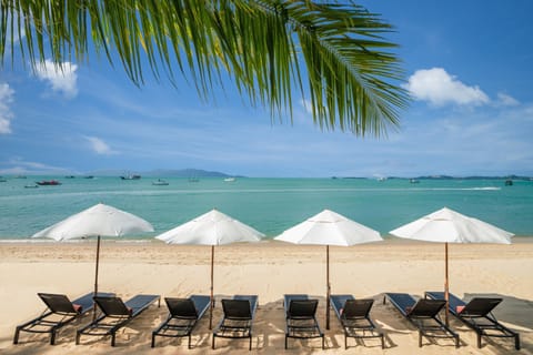 Private beach, white sand, sun loungers, beach umbrellas