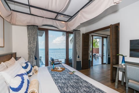 Two-Bedroom Beachfront Pool Villa | Minibar, in-room safe, desk, laptop workspace