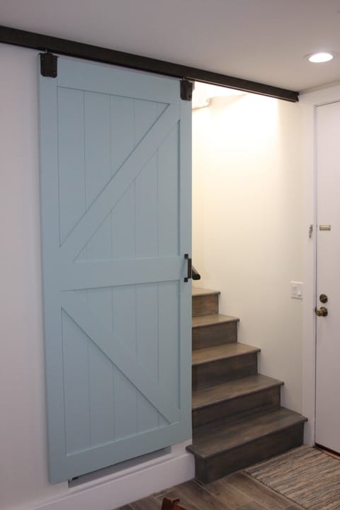 These are the stairs to the master. The barn door closes and locks for privacy!