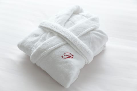 Combined shower/tub, free toiletries, hair dryer, slippers