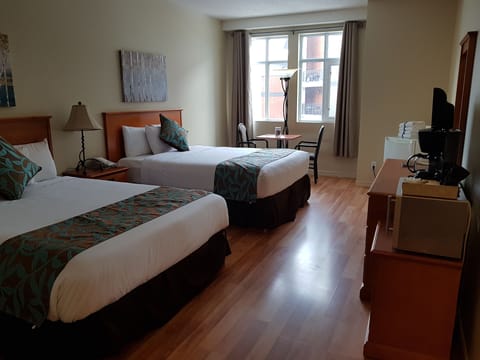 Economy Double Room Single Use, 2 Queen Beds, Accessible, Pool Access | Individually decorated, individually furnished, desk, iron/ironing board