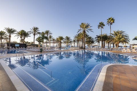 3 outdoor pools, open 9:00 AM to 6:00 PM, pool umbrellas, sun loungers