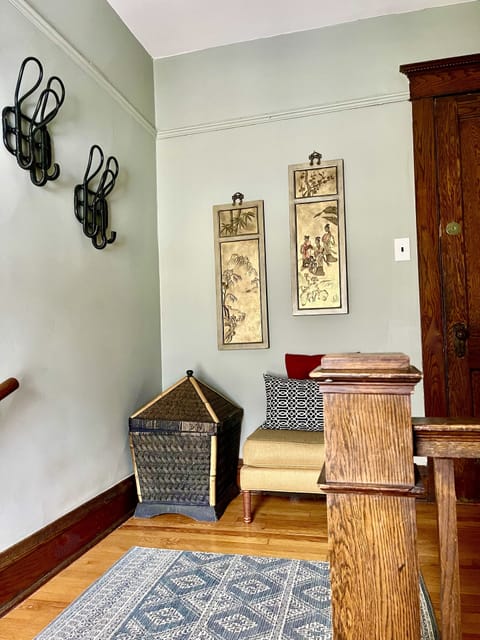 Private entryway with coats racks/seating. The outdoor entrance is also private.