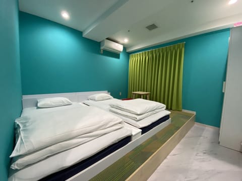 Economy Room, 2 Bedrooms | In-room safe, blackout drapes, free WiFi, bed sheets