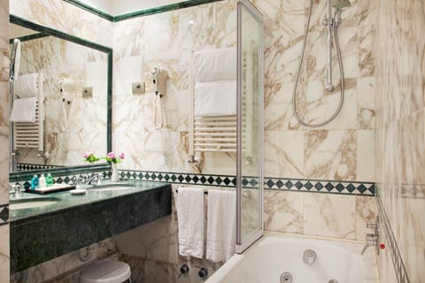 Superior Suite | Bathroom | Bathrobes, slippers, bidet, towels