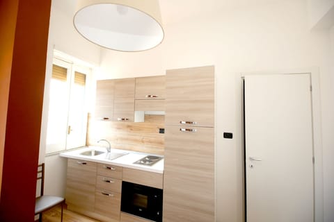 Family Studio, 2 Bedrooms, Kitchen, City View | Private kitchen