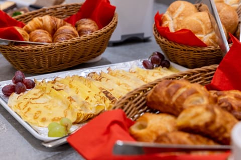 Daily buffet breakfast (EUR 14 per person)