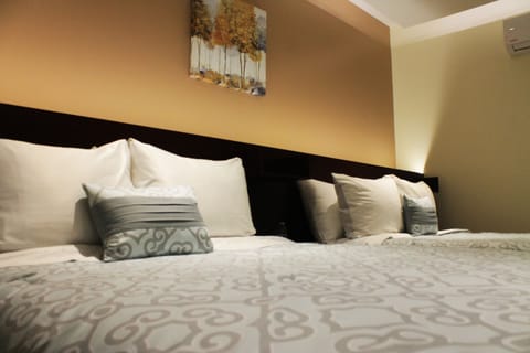 Premium bedding, down comforters, Select Comfort beds, in-room safe