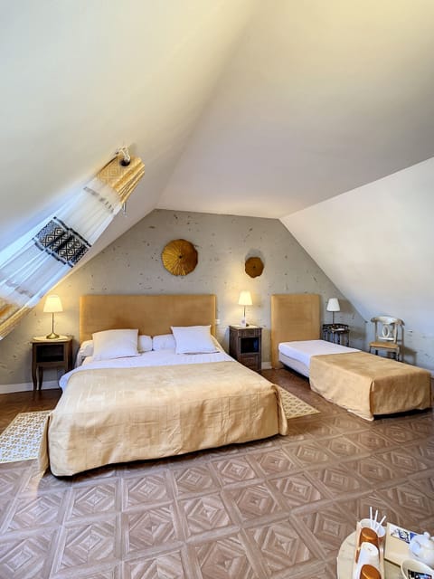 Family Triple Room, Garden View (Nymphéa) | Premium bedding, individually decorated, individually furnished, desk