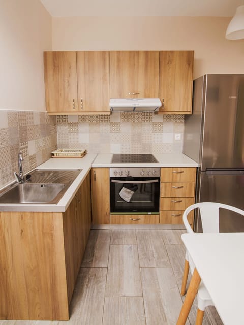 Apartment, Sea View | Private kitchen | Fridge, oven, stovetop, electric kettle