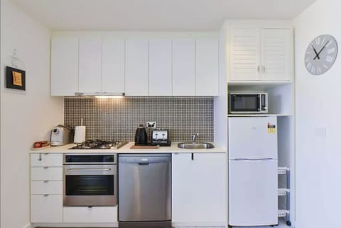 1 Bedroom Apartment | Private kitchen | Fridge, microwave, oven, stovetop