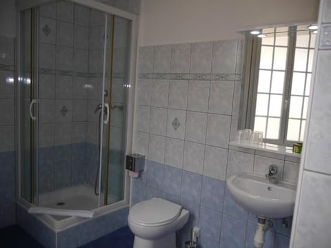 Shower, free toiletries, hair dryer, towels