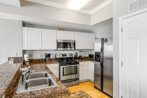 Condo, 2 Bedrooms | Private kitchen | Full-size fridge, microwave, coffee/tea maker, cookware/dishes/utensils