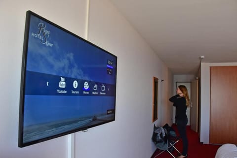 Hypo-allergenic bedding, down comforters, minibar, in-room safe