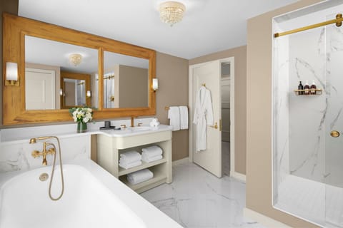 Suite, 1 King Bed | Bathroom | Designer toiletries, hair dryer, towels