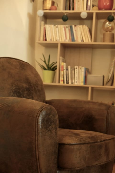 32-inch flat-screen TV with digital channels, TV, books