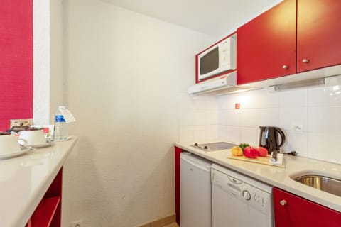 Apartment | Private kitchenette | Fridge, microwave, stovetop, dishwasher