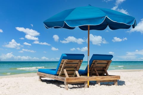 On the beach, beach towels, beach volleyball, beach bar