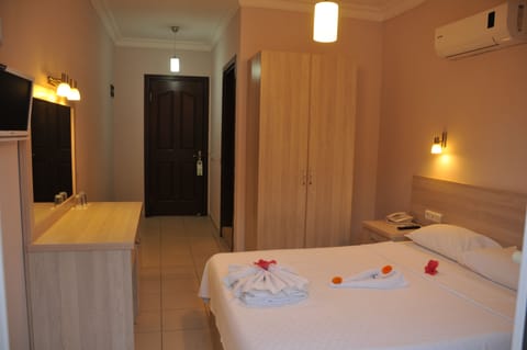 Standard Double or Twin Room | Bathroom | Shower, free toiletries, hair dryer, slippers