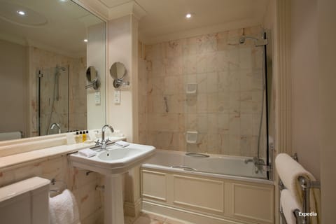 Combined shower/tub, designer toiletries, hair dryer, bathrobes