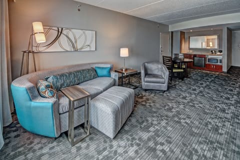 Suite, 1 Bedroom | Living room | 27-inch Smart TV with satellite channels, TV, Netflix