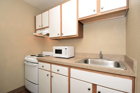 Deluxe Studio, 1 Queen Bed with Sofa bed, Non Smoking | Private kitchen | Full-size fridge, microwave, stovetop