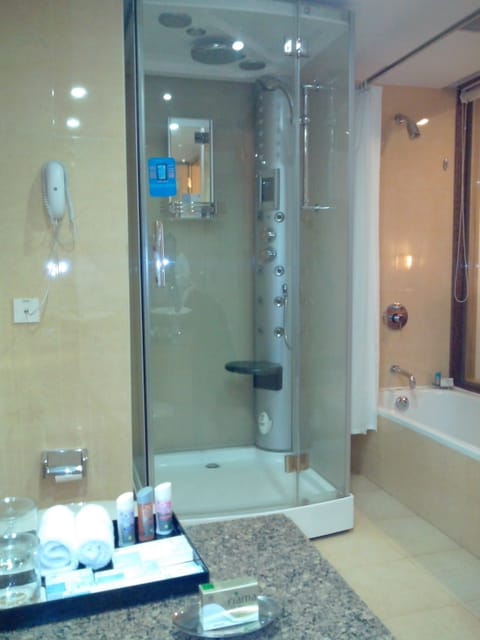 Suite, 1 King Bed | Bathroom | Bathtub, free toiletries, hair dryer, bathrobes