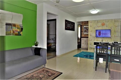 Apartment, 3 Bedrooms | Living area | 40-inch LED TV with cable channels, TV