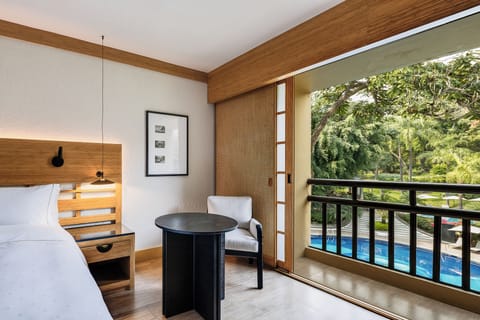 Premium bedding, down comforters, minibar, in-room safe